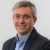 Brian Reichow smiling in photo