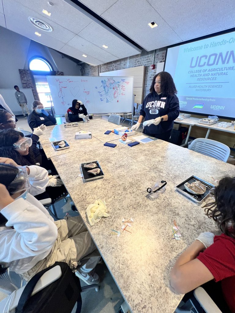 group of students sitting around a table